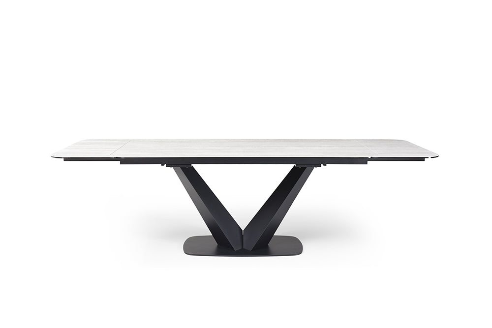 Table with swivel beige chairs